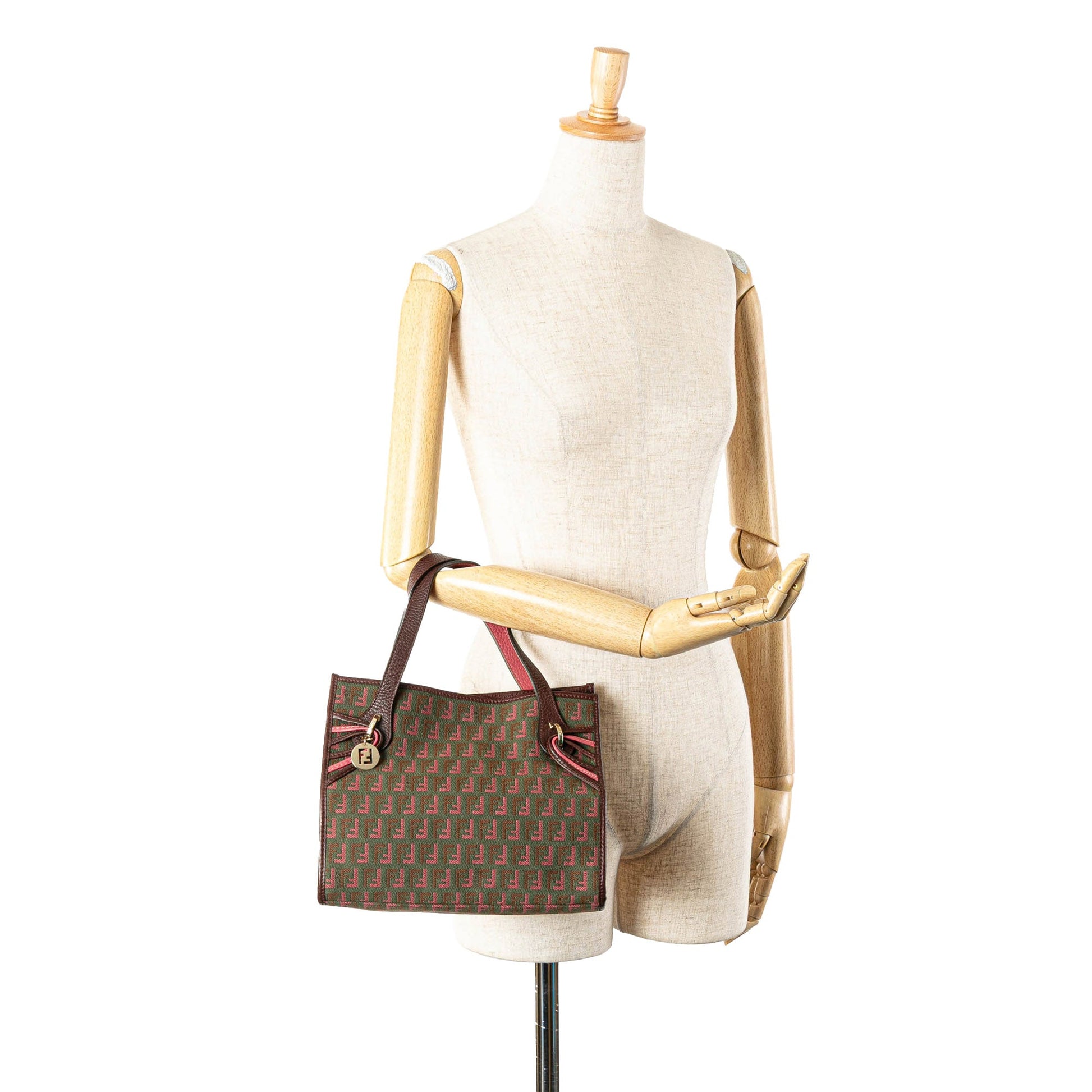 Fendi tote bag shown on a mannequin for size reference and styling scale